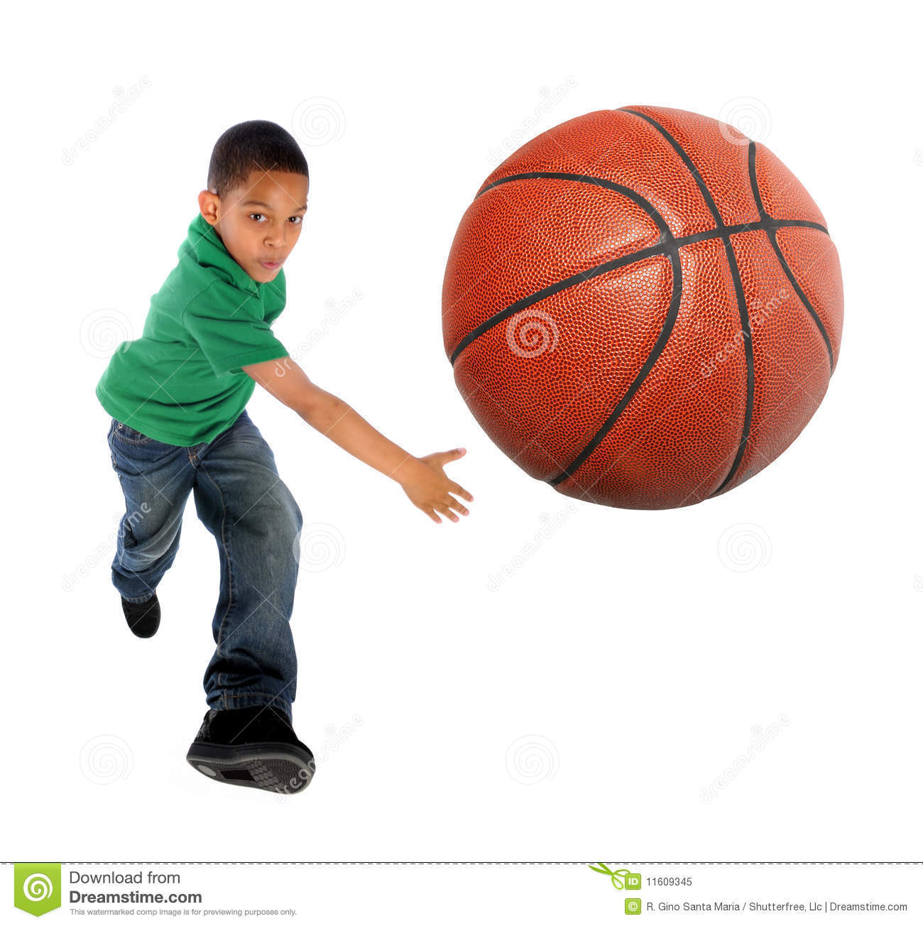 young-boy-playing-basketball-11609345